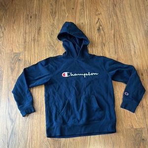Boys size large, navy blue champion, hooded sweatshirt